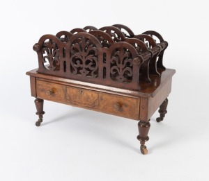 An antique English walnut music Canterbury&nbsp;with single drawer and fretted sheet music dividers, standing on turned legs with castors, circa 1890, 45cm high, 59cm wide, 38cm deep