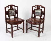 A pair of Chinese rosewood side chairs with marble inset tablet backs, 20th century, 100cm high, 52cm wide, 42cm deep