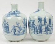 A pair of antique Japanese blue and white porcelain vases, Meiji period, 19th century, bearing remains of paper labels, ​​​​​​​22cm high - 2