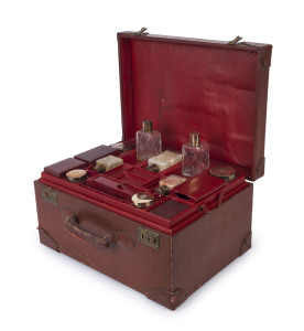 A fine vintage ladies travelling set, sterling silver and crystal housed in original burgundy red leather case,&nbsp;circa 1930s, ex Evelyne Greig, a model who worked with Horst P. Horst, the case 38cm high, 50cm wide, 27cm deep