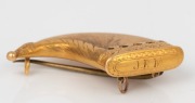 An antique Indian 22ct gold mounted tiger claw brooch with engraved decoration and ownership monogram "J.R.M.", 19th century, ​​​​​​​4cm wide overall. - 2