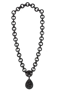 An antique carved vulcanite and glass necklace and pendant with grape motif, 19th century, the chain section 60cm long