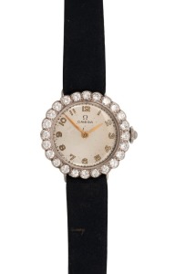 OMEGA vintage cocktail wristwatch in white gold case with diamond bezel, ​​​​​​​2.5cm wide including crown.