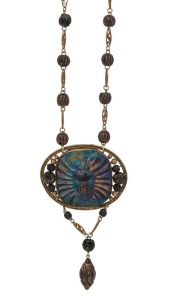 A antique Bohemian iridescent glass scarab beetle pendant necklace mounted in gilt metal with carved beads, most likely LOETZ, circa 1900, ​​​​​​​the pendant5.5cm wide, the chain section 48cm long.
