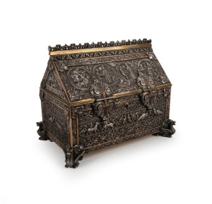 An unusual reliquary casket jewellery box, cast bronze with silvered finish and original burgundy button silk interior, 19th century, 18cm high, 23cm wide, 14cm deep