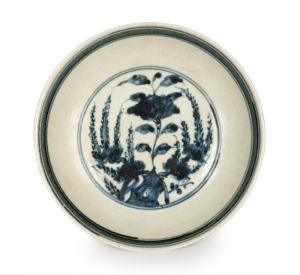 A Chinese blue and white porcelain bowl with floral landscape vignette, Qing Dynasty, 18/19th century, six character Ming mark to base, 18cm diameter