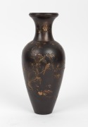 A fine quality Japanese bronze vase adorned with blossom tree and birds, highlighted in gold, copper and silver, Meiji Period, 19th/20th century, three character seal mark to base, 24cm high
