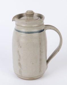 HAROLD HUGHAN pottery jug with sgraffito decoration and lid, signed "Hughan", 23cm high