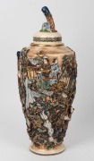 An antique Japanese lidded urn, intricately decorated with applied and raised scene of figures in landscape, Meiji Period, 19th/20th century, seal mark to base, 52cm high - 4