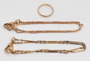 A vintage yellow gold wedding band (2.4 grams), together with two antique fob chains, early to mid 20th century, (3 items).