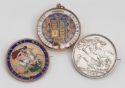 An 1844 English silver crown with gilt finish and enamel overlay mounted in 9ct rose gold as a pendant, together with an 1818 Georgian silver crown with enamel highlights mounted as a brooch, and an 1887 English silver crown coin mounted as a brooch, 19th