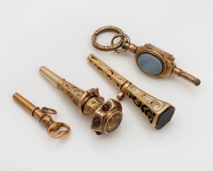 Four assorted antique gold finished pocket watch keys, three decorated with enamel&nbsp;and or hard stone, 19th century, the largest 3.5cmlong