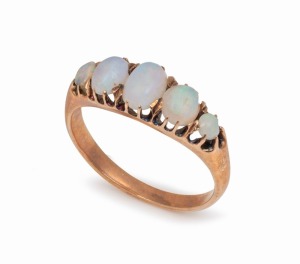 An antique 9ct rose gold ring, set with five graduated and polished solid opals, 19th/20th century, ​​​​​​​3.2 grams