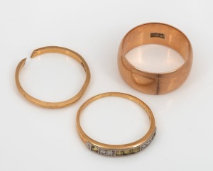 Three assorted 18ct gold rings, one with stones, one cut, 19th/20th century, all stamped "18ct", ​​​​​​​11.6 grams total.