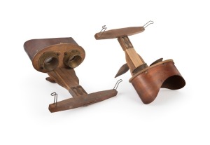 Two c. 1890s handheld stereoscopes with flanged metal eyepieces. (2 items)