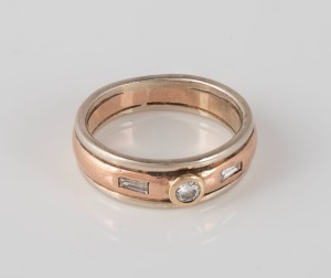 A white and yellow 9ct gold ring,&nbsp; inset with 3 small diamonds, 5.4 grams.