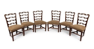 A good set of six Irish George III mahogany ladder back dining chairs with pierced and scroll carved back splats with bead and line decoration. Fluted&nbsp;front legs united by an H stretcher plus&nbsp;generous sized seats with overstuffed light brown upholstery, c