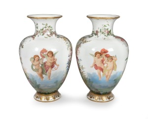 An impressive pair of antique French exhibition vases, made from white glass of&nbsp;baluster form with gilt decorated flared rim and ogee moulded foot. Finely hand-painted with floral, butterfly decoration featuring a winged putti and fairy, signed "P.A. Rous