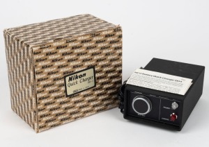 NIPPON KOGAKU: DH-1 Quick Charger, c. 1970s, in maker's box with instruction booklet.