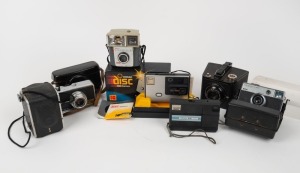 KODAK: Group of seven cameras - one Six-16 Brownie Special, one Duaflex&nbsp;with leather covering, one Starmite II, one Instamatic 333 in case, one Instamatic 500 in case, one Kodak Disc 3600, and one Kodak Disc 4000 in maker's box with printed matter. (7 cam