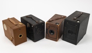 VARIOUS MANUFACTURERS: Group of four 1920s box cameras - one Houghton Ensign 2 1/4B, one Houghton Ensign 2 1/2, one Kodak Rainbow Hawk-Eye No. 2 50th anniversary model in brown, and one anonymous model. (4 cameras)