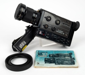 CANON: 1014XL-S Super-8 movie camera [#131670], c. 1981, with C8 Macro 6.5-65mm f1.4 lens, lens cap, lens hood, and instruction booklet.