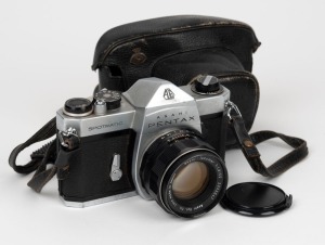 ASAHI KOGAKU: Spotmatic SLR camera [#1400499] in chrome, c. 1964, with Super-Takumar 55mm f1.8 lens [#2333647], lens cap, and maker's leather case.