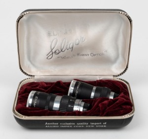 SOLIGOR: Two Elitar lenses with all front and rear caps in maker's felt-lined box - one Telephoto 1&frac12;" f1.9 and one Wide Angle 6.5mm f1.9. (2 lenses)