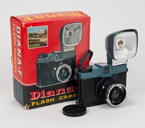 DIANA: Diana-F plastic 120 film camera, c. 1960s, in maker's box with lens cap, flash attachment, and wrist strap.