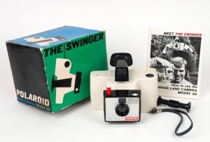 POLAROID: Swinger Model 20 instant camera, c. 1965, in maker's box with instruction booklet and film spool.