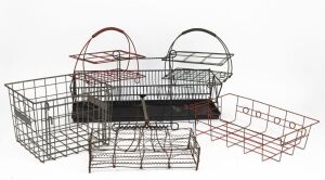 Seven assorted vintage wirework baskets, including bottle carriers, 20th century, the largest 60cm wide.