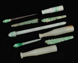 Nine assorted pieces of vintage and antique Chinese jade including&nbsp;three cigarette holders, three carved handles, hairpin, and two bodkins, 19th/20th century, the largest 12cm long