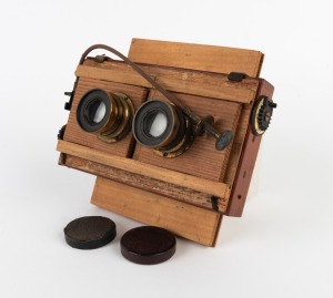 THORNTON-PICKARD: Twin Beck Symmetrical lenses, both with original leather caps, mounted on Thornton-Pickard 'Time & Inst.' roller-blind shutter, together with Watson Bowden 'The Antinuous' shutter release cable, c. 1900s.