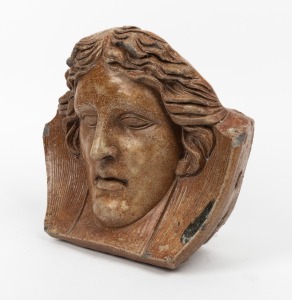 An antique stoneware architectural face mask, unknown origin, 19th century, 26cm high, 30cm wide, 13cm deep