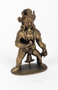 An antique Tibetan bronze deity statue, 19th/20th century, 14.5cm high