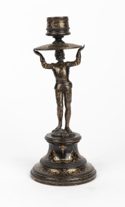 An antique Continental bronze figural candlestick with gilt decorated highlights, most likely Italian, 19th century, 19cm high