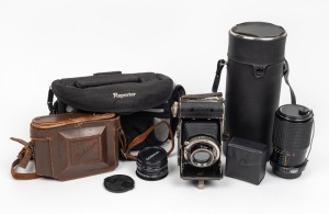 VARIOUS MANUFACTURERS: Accumulation of fifteen photography items, including one c. 1930s&nbsp;Balda Baldax&nbsp;camera with maker's leather case, one RMC Tokina lens with front and rear caps and case, five lens filters, and others.