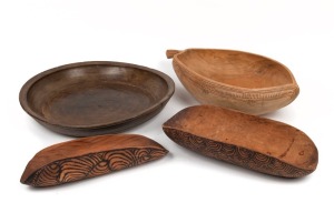 Four assorted carved timber tribal bowls, 20th century, ​​​​​​​the largest 50cm wide