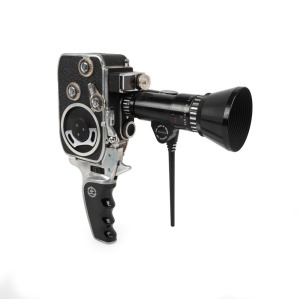 BOLEX-PAILLARD: Bolex B8L double-8 movie camera [#847915], c. 1958, with Som Berthiot Pan-Cinor R 8-40mm f1.9 lens [#P82080] with attached zoom finder, lens hood, pistol-grip attachment, and body cap.