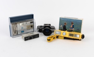 MINOLTA: Group of five miniature cameras - one c. 1960 Minolta Model P, one c. 1964 Minolta 16 Ps in maker's box with accessories, one c. 1976 Minolta 110 Zoom SLR, one c. 1980 Weathermatic A, and one c. 1983 Disc-5 in plastic case. (5 cameras)