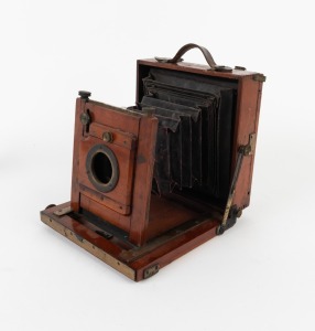 4&frac34; x 6 &frac12;" plate field camera body, with "The Camera Court London" retailer's inlay.