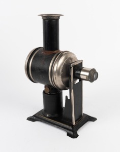 Circa 1890s children's magic lantern in maker's wooden box, 27cm high.