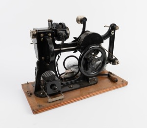 PATH&Eacute;: Hand-cranked KOK-type 28mm movie projector [#9420], c. 1912, with attached 52.5 x 25.5cm baseboard, locking tin lid with 'Path&eacute; fr&egrave;res' inscription, and spare parts.