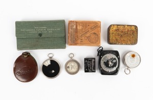 VARIOUS MANUFACTURERS: Group of six exposure meters, including one Watkins Bee Exposure Meter in maker's box with printed matter, one Wynne's Infallible Exposure Meter in maker's tin, one Zeiss Ikon Diaphot in pouch with instruction booklet, and others. (