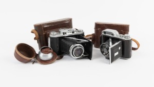 HOUGHTON: Two 120 film cameras, both with maker's leather case&nbsp;- one c. 1937 Ensign 220 Auto-Range with Ensar Anastigmat 75mm f3.5 lens, together with one Ensign Selfix 820 Special with Xpres 105mm f3.8 lens and lens hood. (2 cameras)