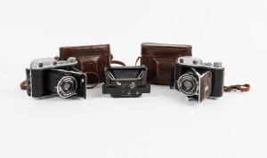 HOUGHTON: Group of three cameras - one c. 1920 Ensignette No. 1, together with two Ensign 220 Auto-Range models, both in maker's leather case. (3 cameras)