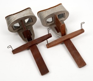 UNDERWOOD & UNDERWOOD: Two c. 1890s handheld stereoscopes. (2 items)