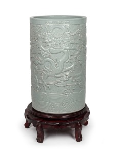 A Chinese blanc de chine porcelain floor vase on timber stand, 20th century, 76cm high overall
