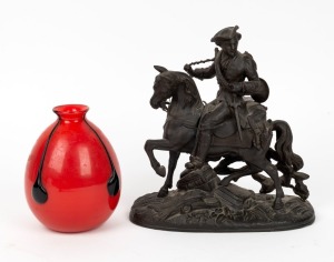 An Antique spelter statue of a hunter on horseback A/F, together with a Bohemian&nbsp;red Tango glass vase with black trail decoration, 20th century; the statue 26cm high