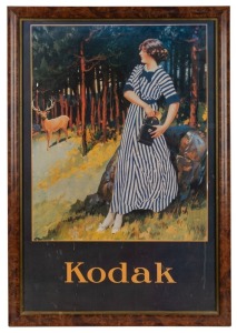 KODAK: Framed 87.5 x 60cm 1920s-era reproduction promotional poster of young woman preparing to photograph deer.